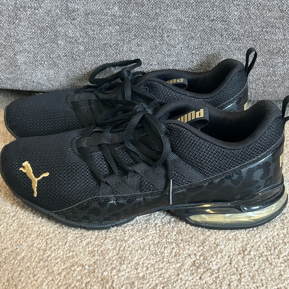 Puma Black and Gold Sneakers